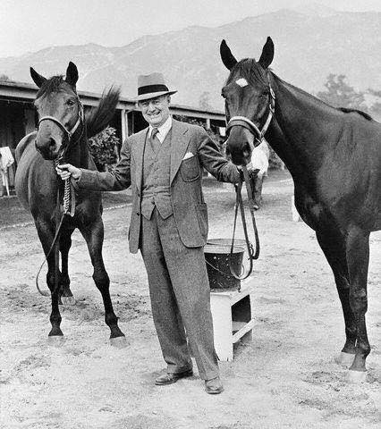 A wonderful picture of Seabiscuit (left) and Kayak II (right) with their owner Charles Howard.